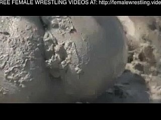 Girls wrestling close to the vileness